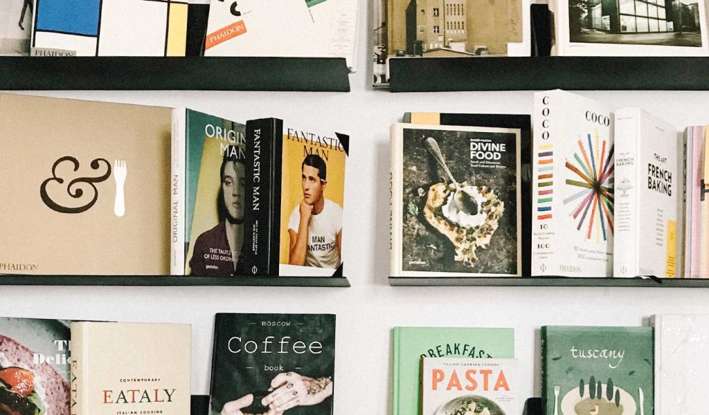 Various books on wall shelves