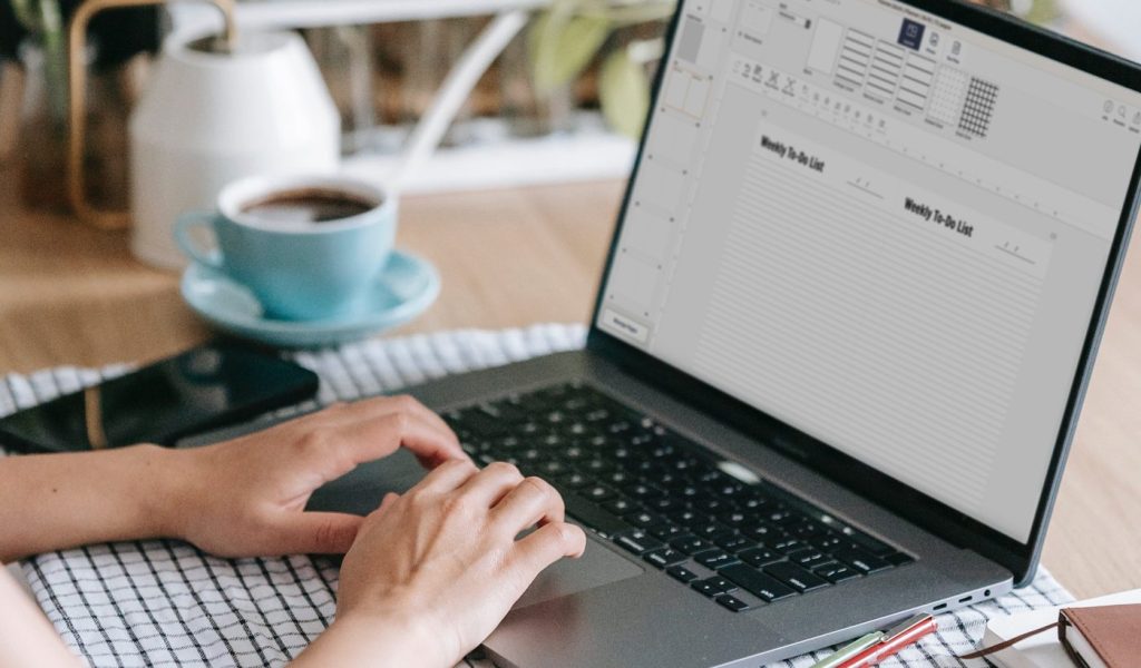 Person on a laptop editing a book